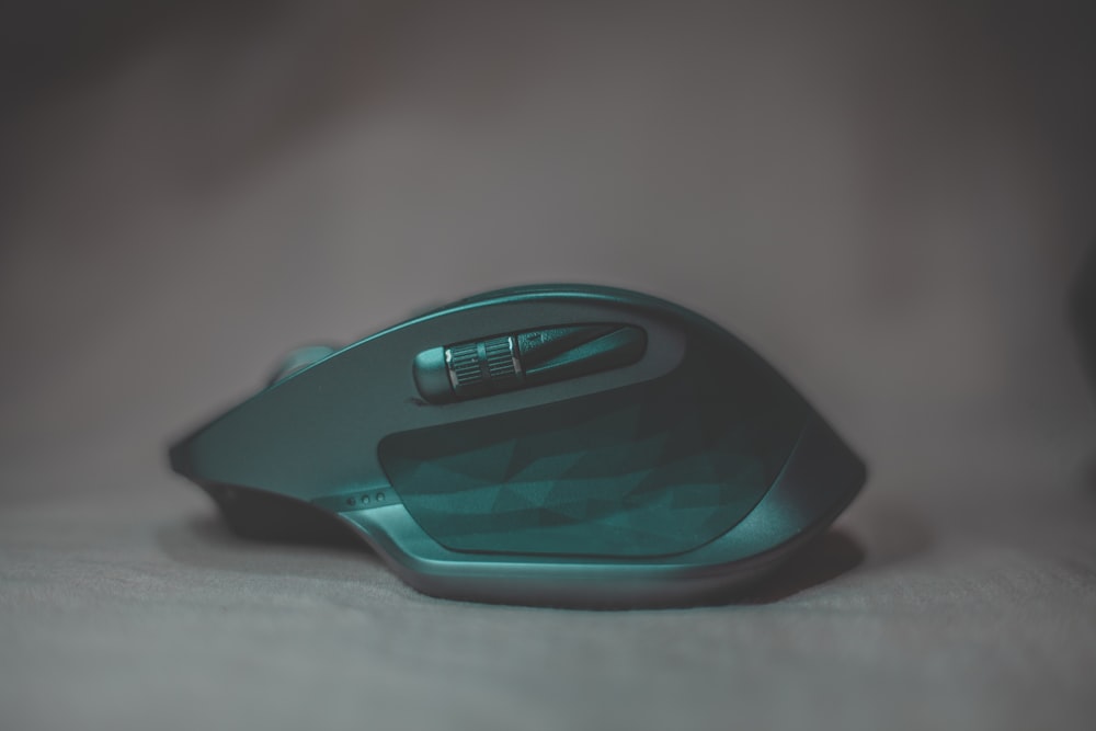 green and black cordless computer mouse