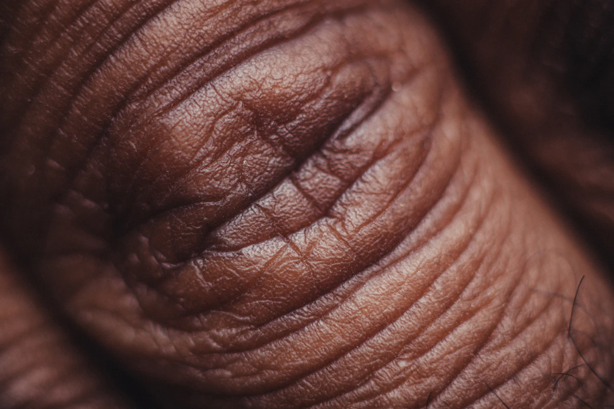 Close-up of a hand, representing a confidential clinical consultation