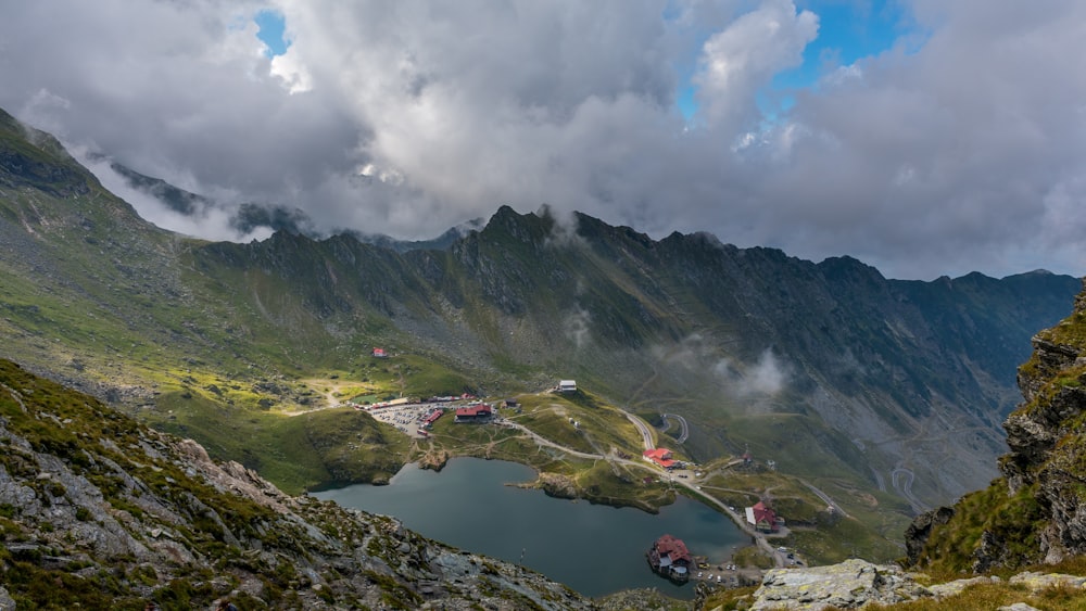 green and brown mountains under white clouds during daytime