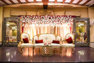 red and white floral sofa set