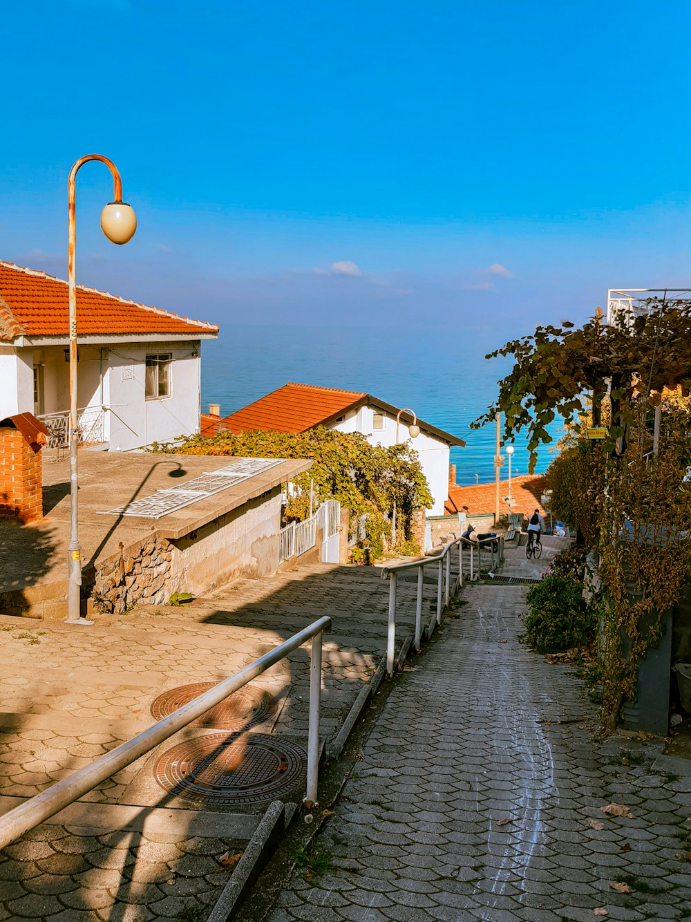 brown and white concrete houses under blue sky during daytime