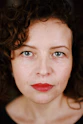 woman with red lipstick and brown hair