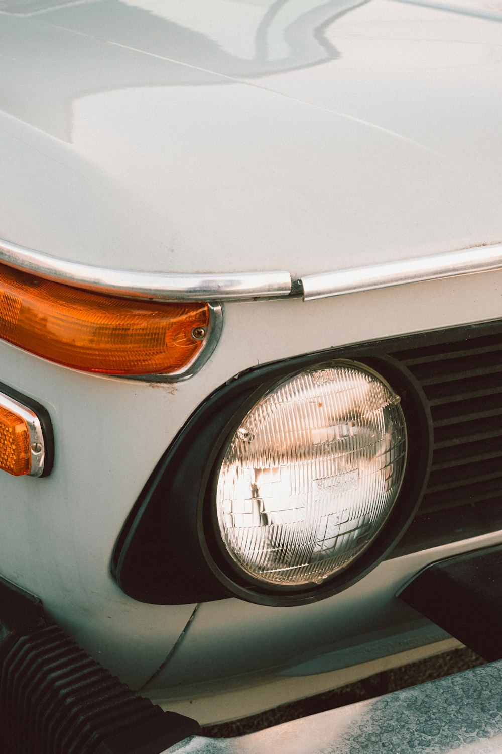 white car with orange and white light