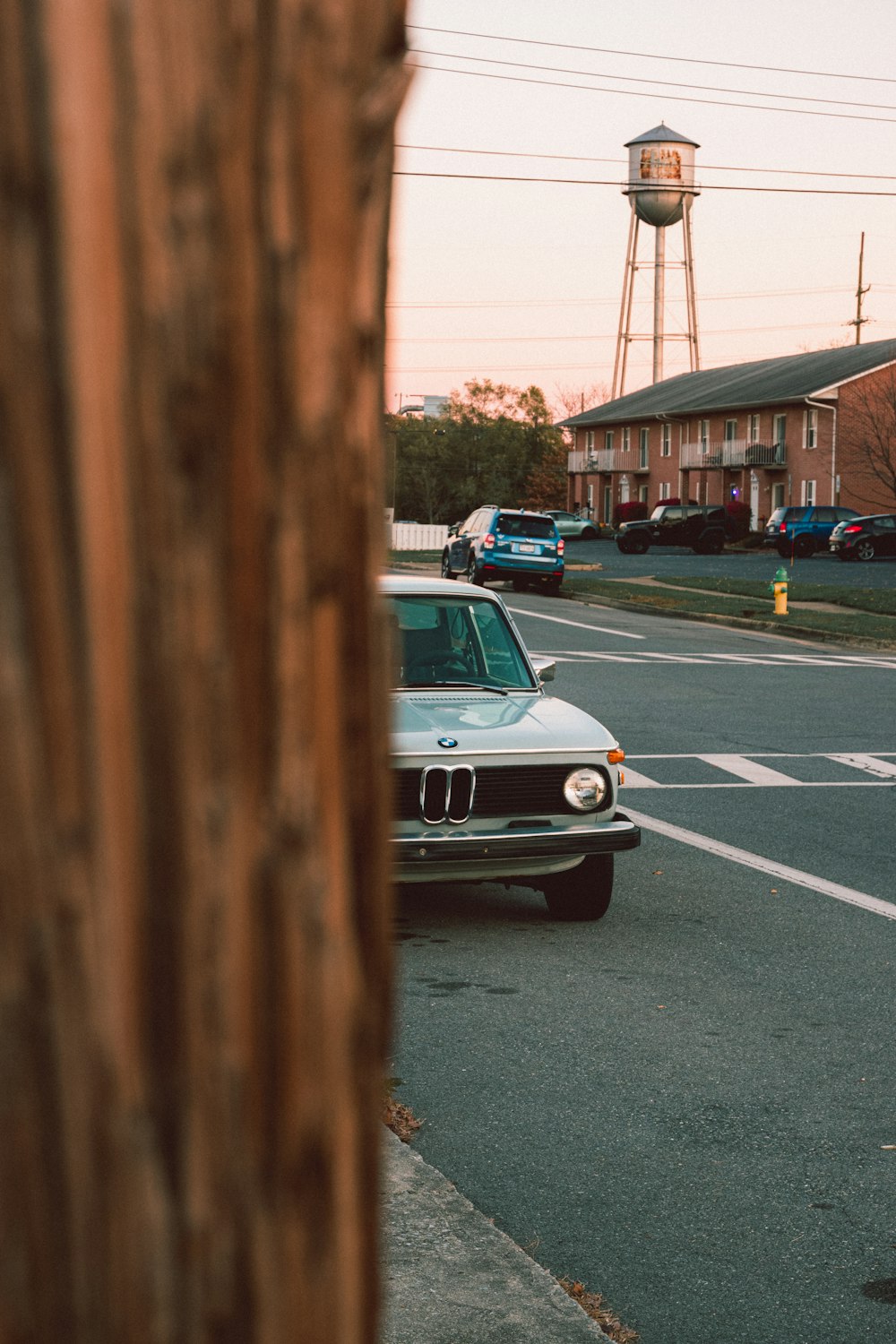 white car parked on the side of the road