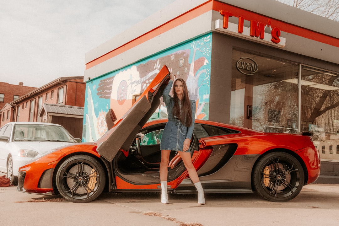 Girl influencer model with McLaren car on social media - Photo by Joshua Rondeau | best digital marketing - London, Bristol and Bath marketing agency