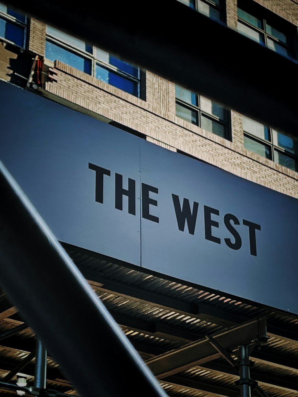 a sign that reads the west on a building
