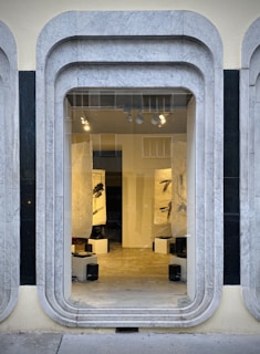 Interior wall showcasing sleek, modern graphic installations enhancing the store’s atmosphere.