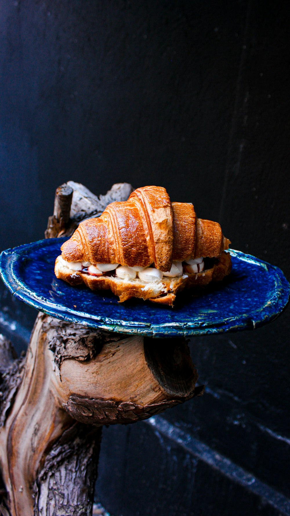 brown bread on blue ceramic plate