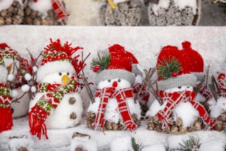 white snowman with red and green christmas baubles