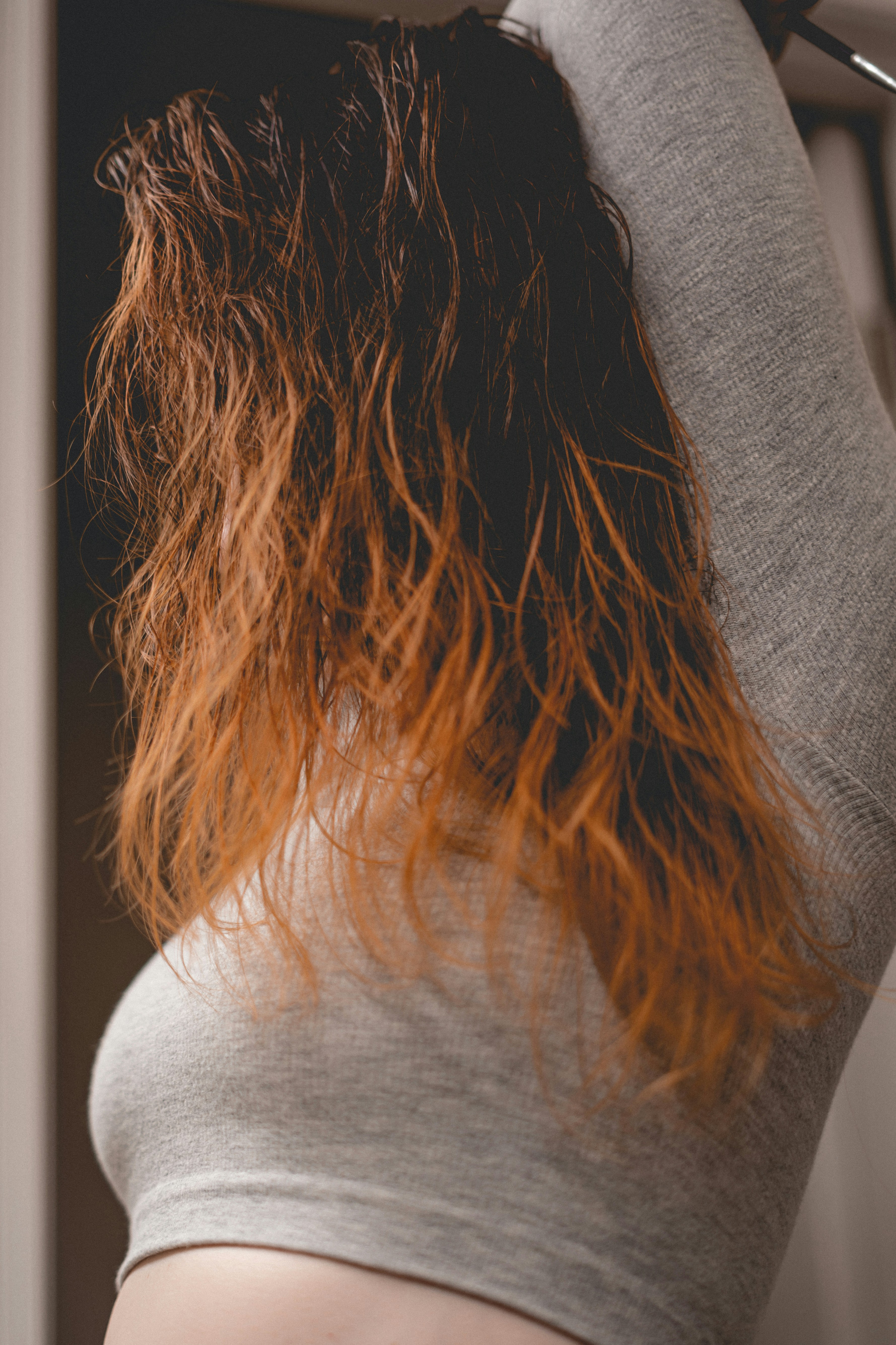 woman in gray long sleeve shirt