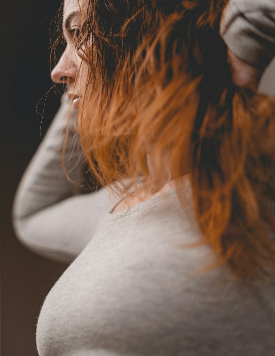 woman in white long sleeve shirt