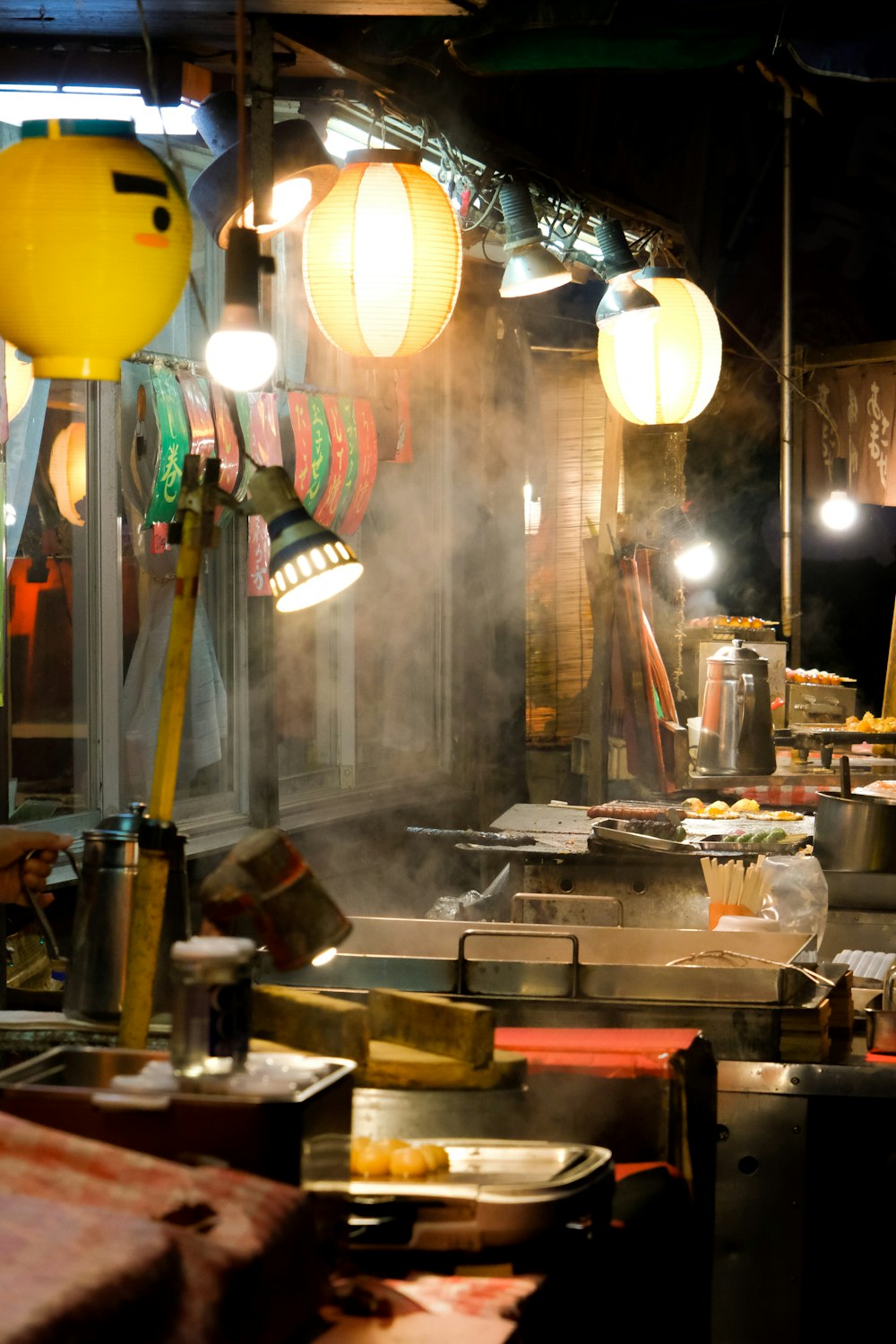 silver and yellow pendant lamps