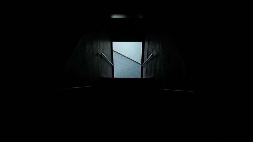 white light in dark tunnel