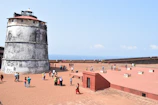 Fort Aguada view with people on beach during daytime