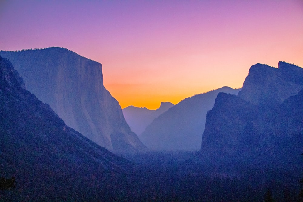 silhouette of mountains during sunset