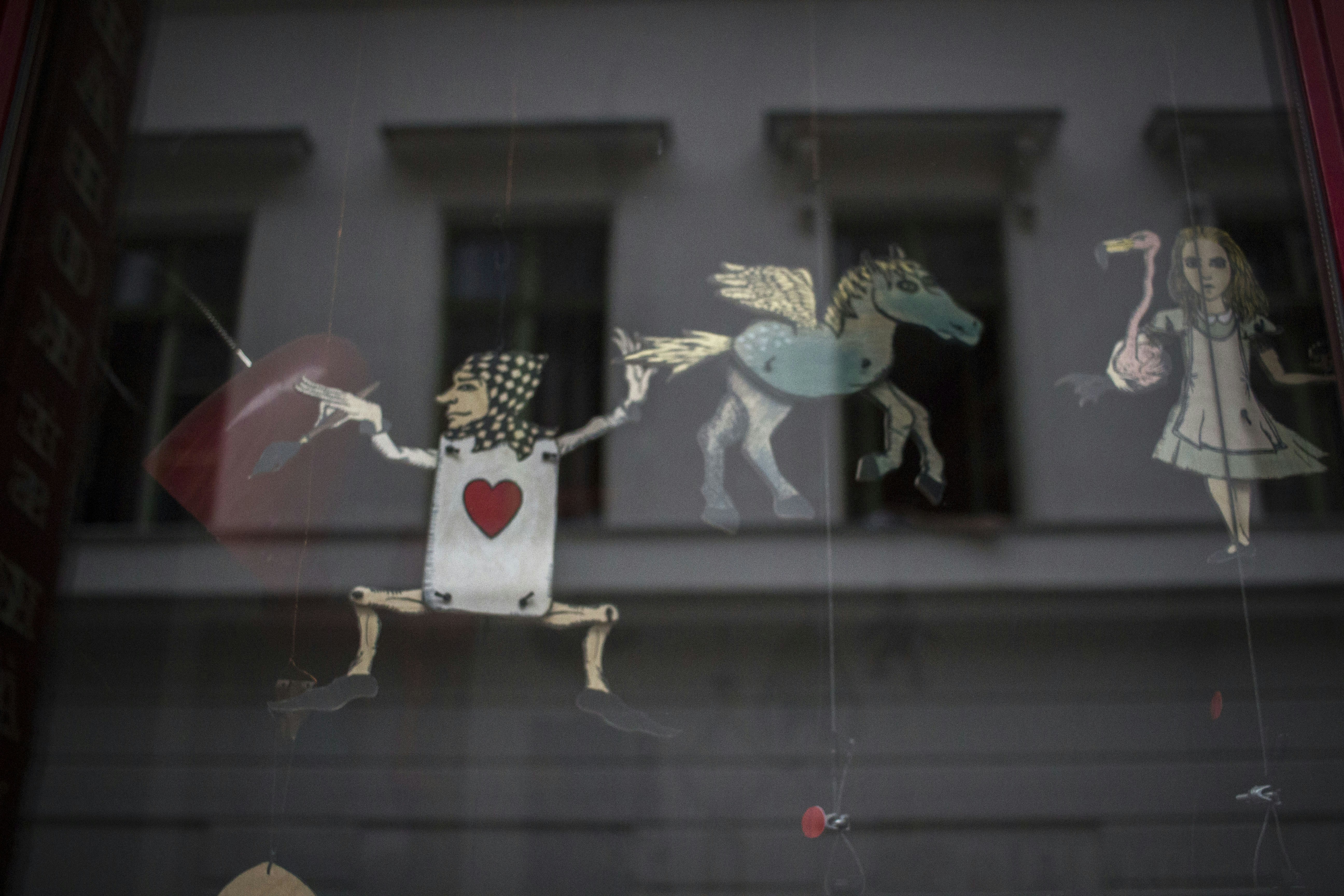 white and black cow hanging decor