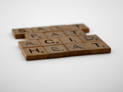 brown wooden blocks on white table