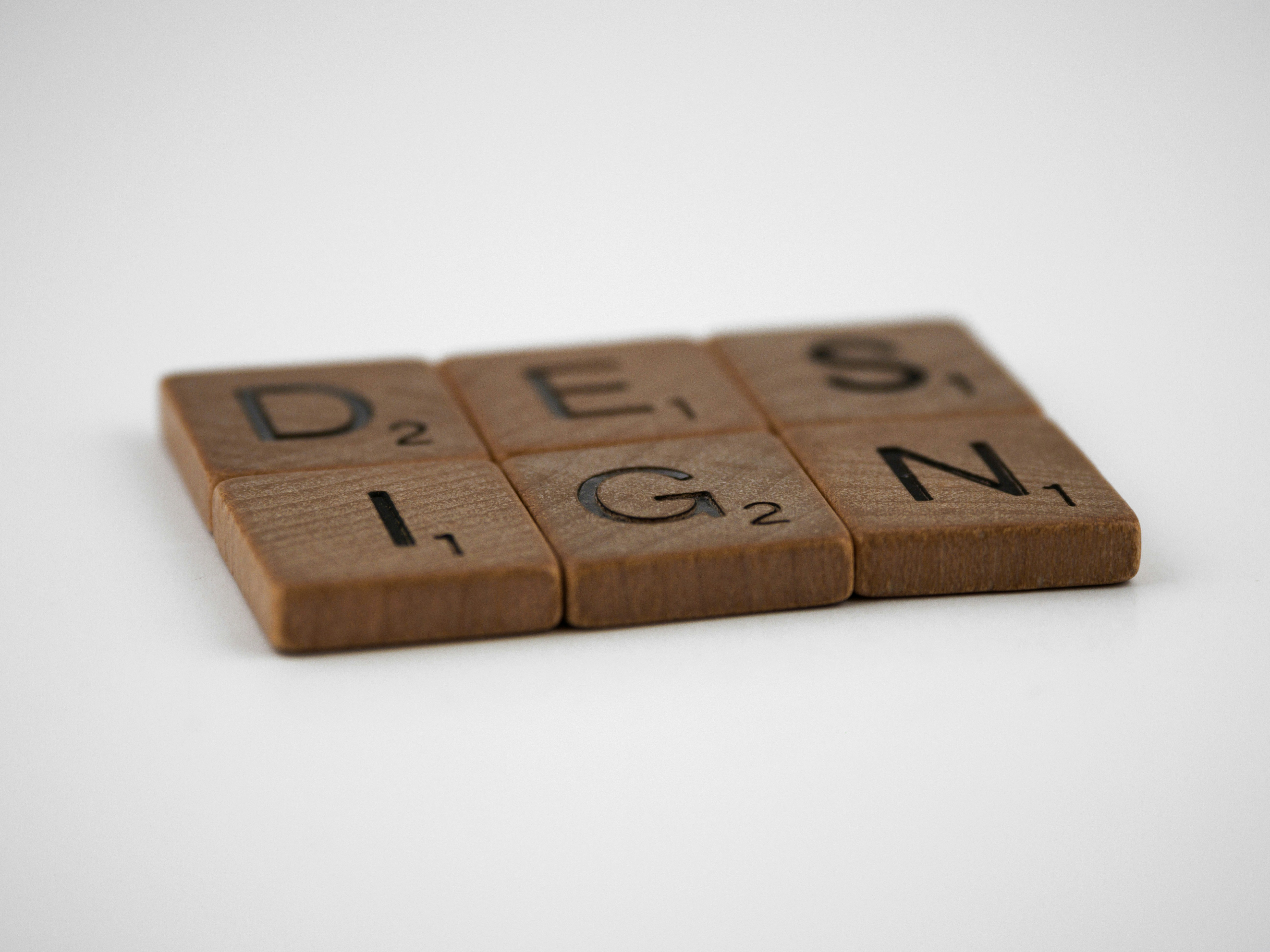 scrabble, scrabble pieces, lettering, letters, wood, scrabble tiles, white background, words, luck, luck is the residue of design, design, residue, plan, organise, planning, outline, intentional, mindful, mindfulness, patience, <br />
