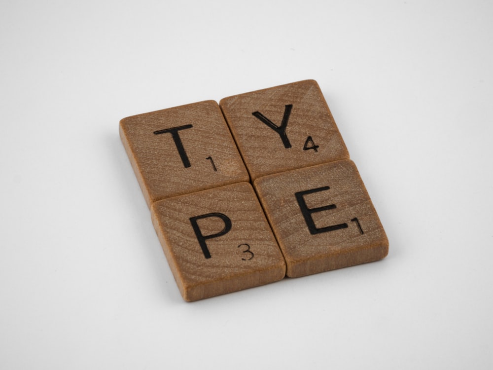 brown wooden blocks on white surface