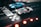 A vibrant slot racing track with cars in action.