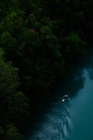 A kayaker paddling gently around the distinctive horseshoe-shaped bend in the river
