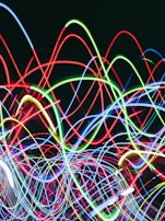 Electric magenta neon lines pulsing rhythmically over a dark, glitchy background.