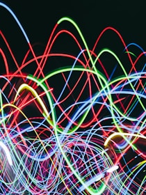 Electric magenta neon lines pulsing rhythmically over a dark, glitchy background.