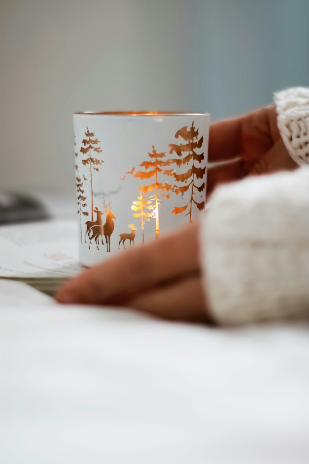 white and red floral ceramic mug