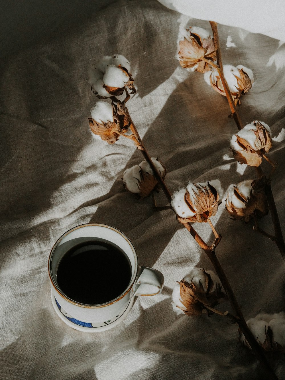 white ceramic mug with black liquid