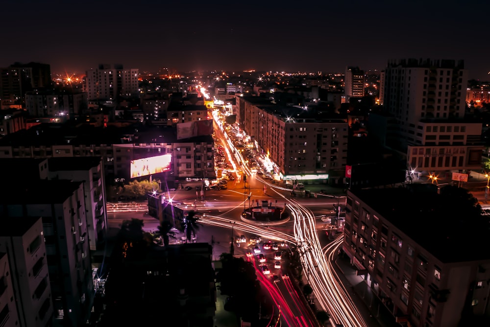 city with high rise buildings during night time