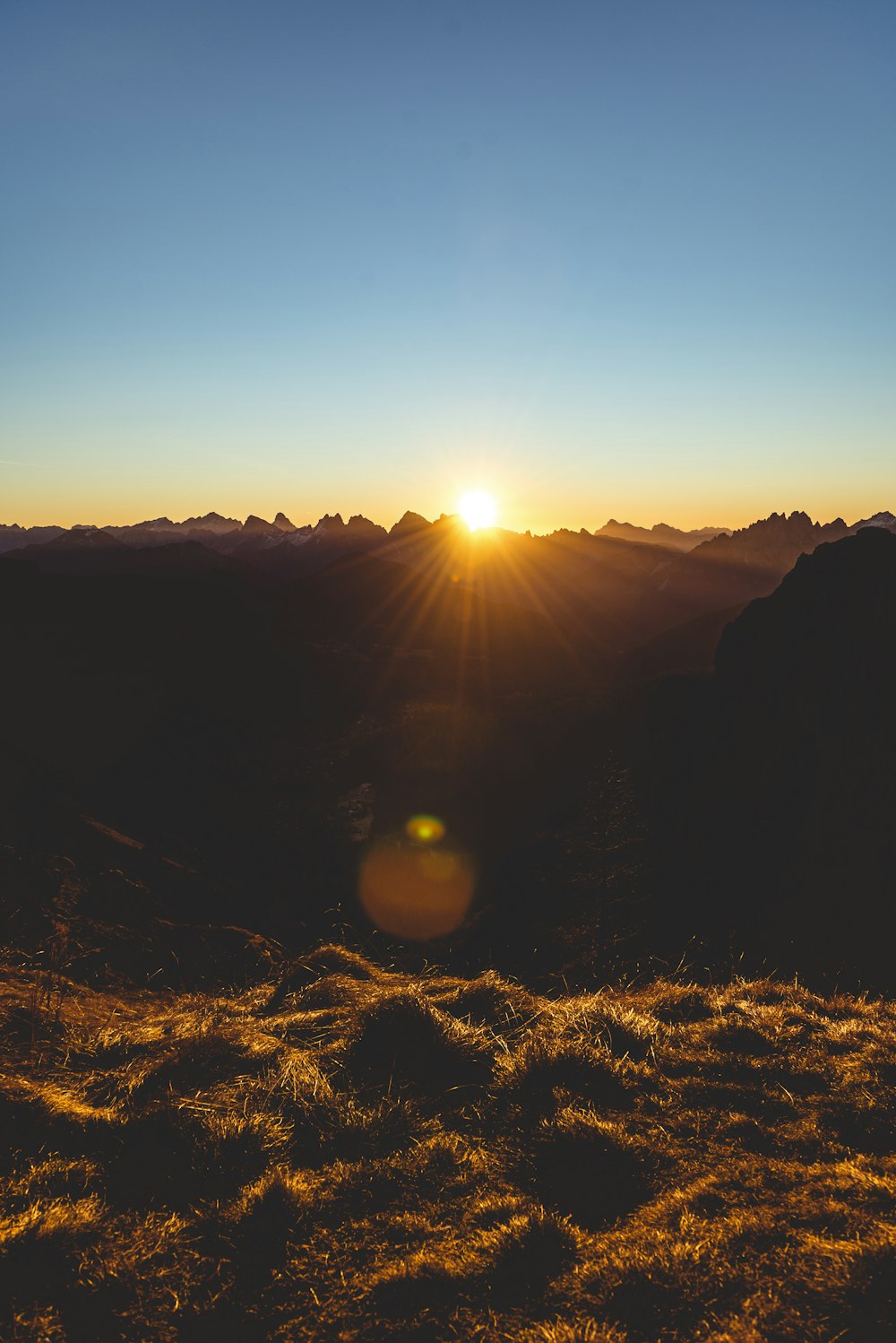 sun setting over the mountains