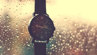 black strap black round chronograph watch