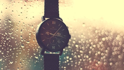 black strap black round chronograph watch