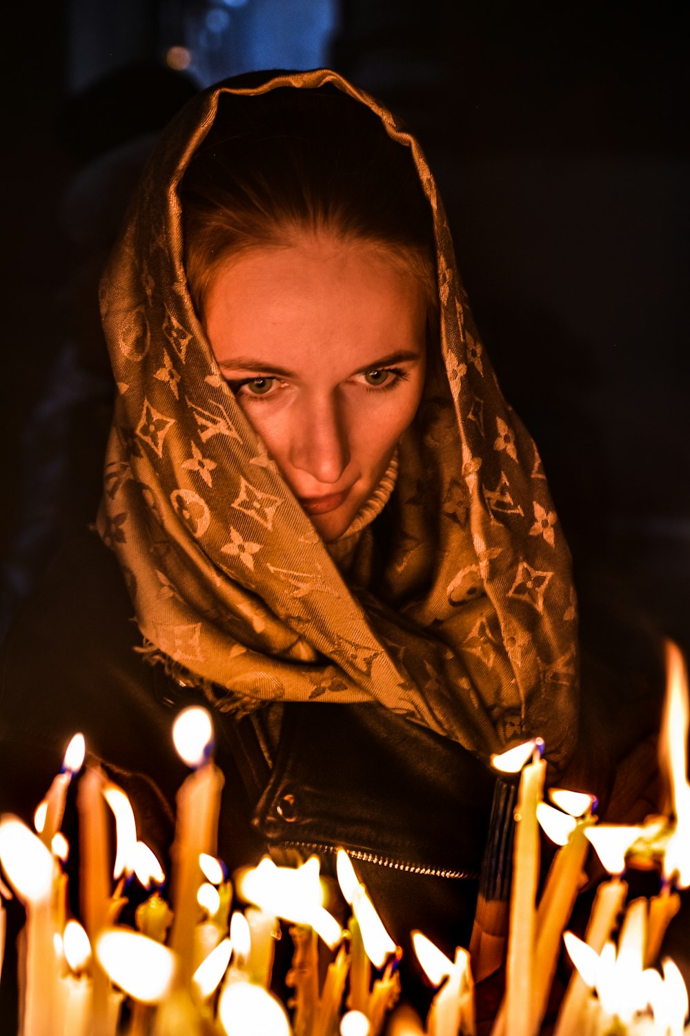 woman in brown and beige floral hijab