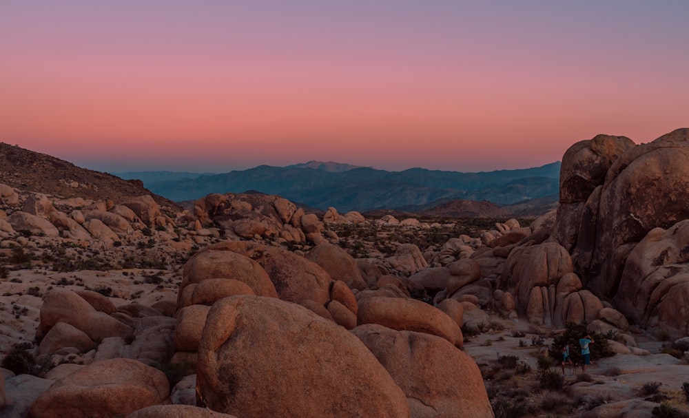 brown rocky mountain during sunset