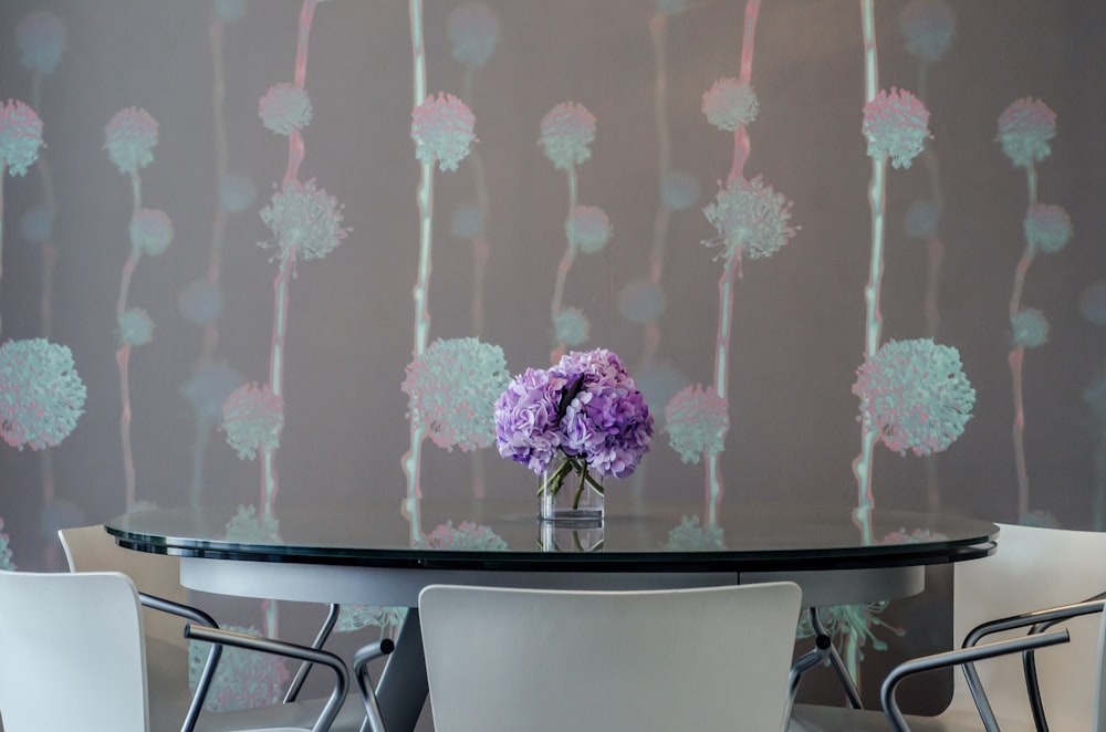 pink and white flowers on white ceramic vase