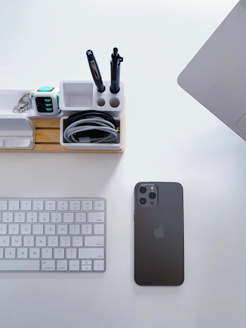 A neatly arranged desk featuring Ordonest's minimalist compartmentalized storage boxes with stationery and gadgets perfectly in place.