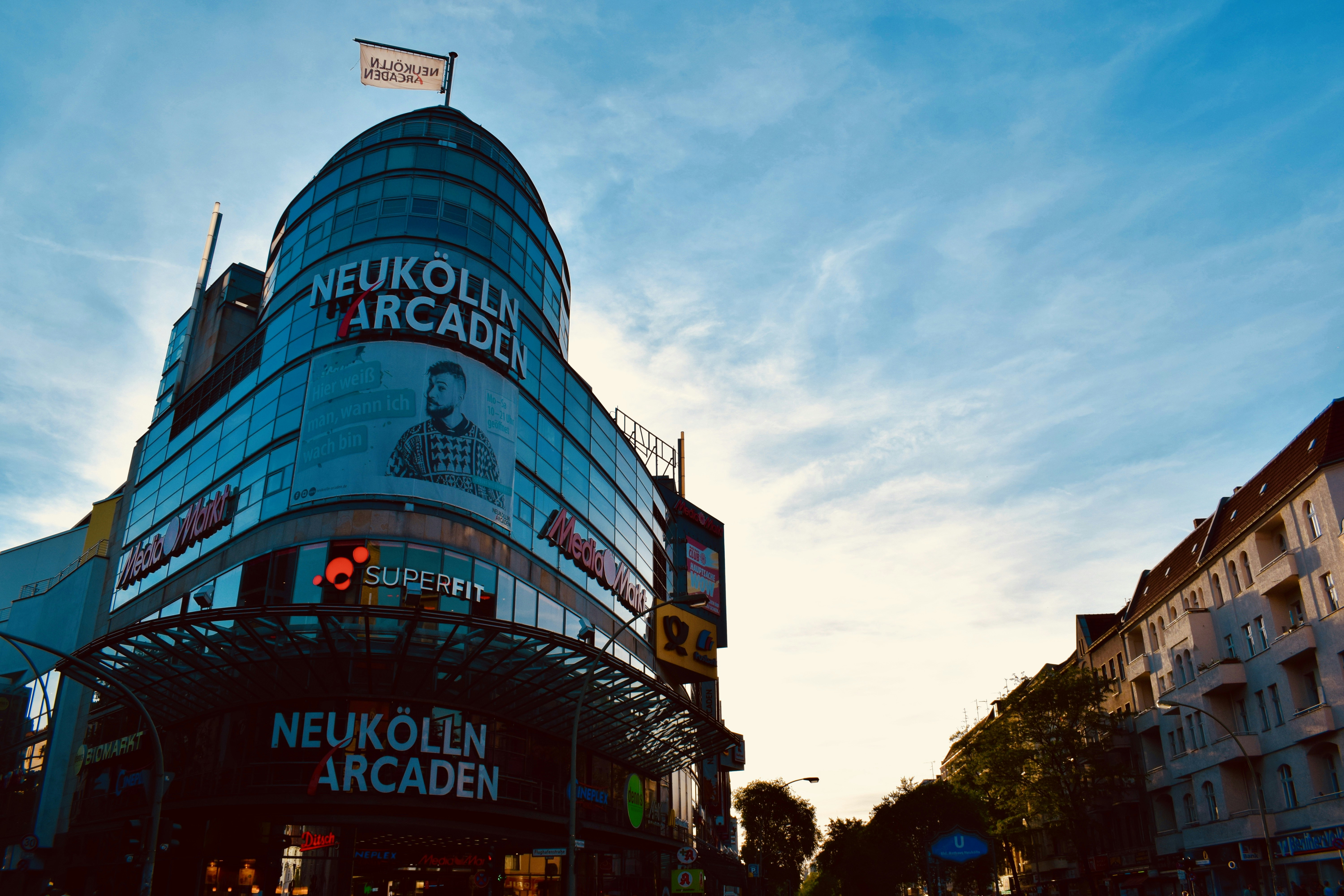 blue and white concrete building during daytime