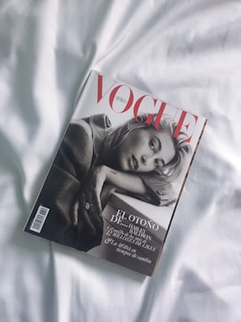 Elegant magazine cover featuring a bold, modern fashion portrait.