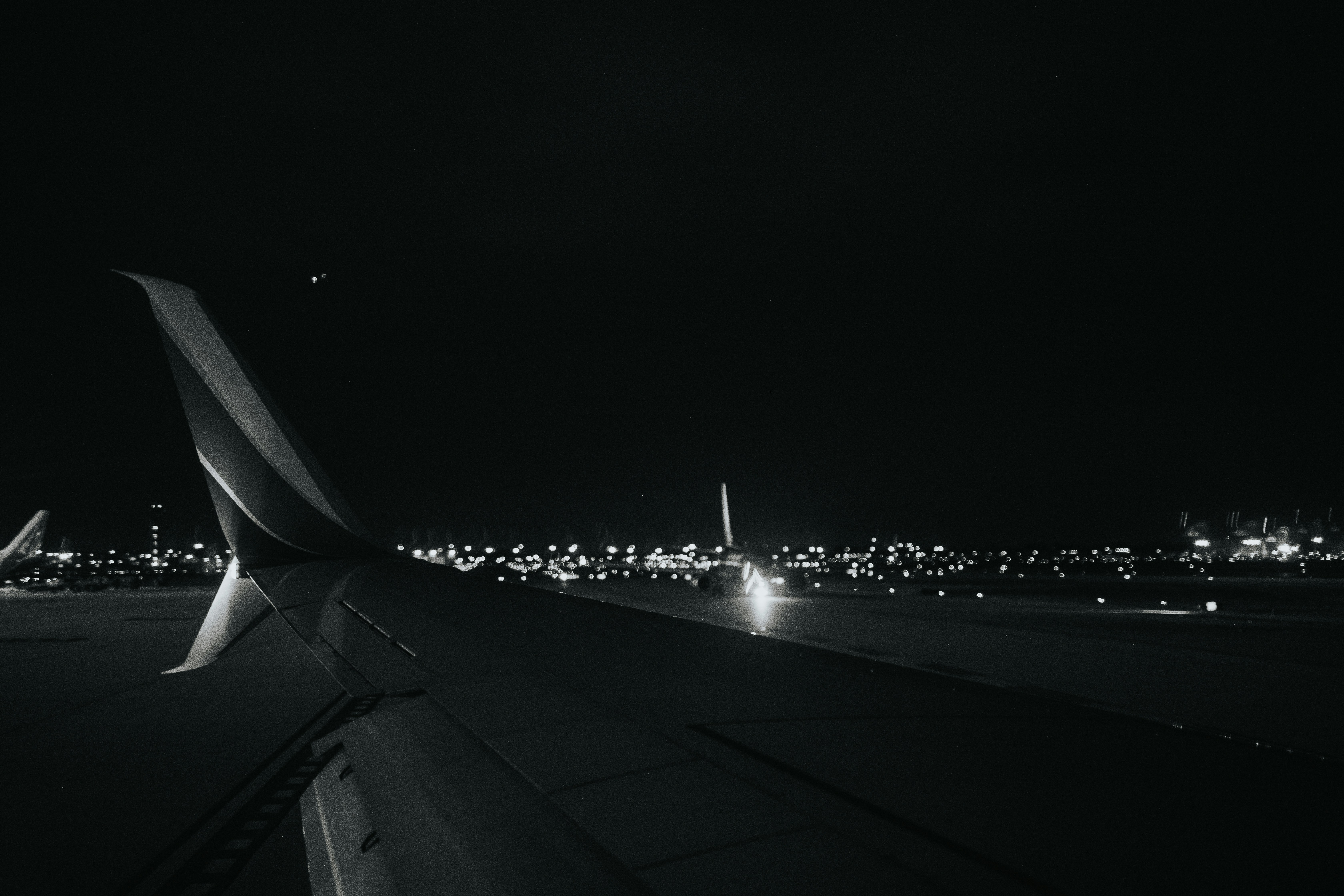 city lights turned on during night time