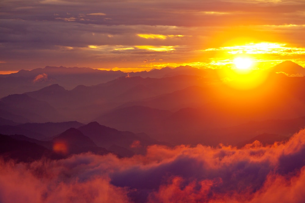 silhouette of mountains during sunset