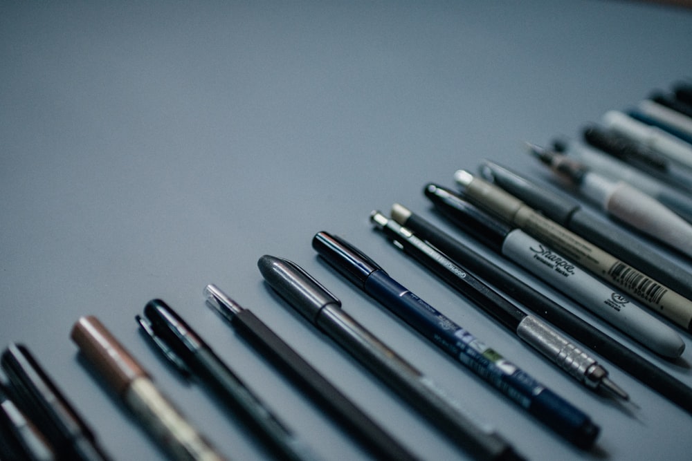 Gray click pen on open book photo – Free Brown Image on Unsplash