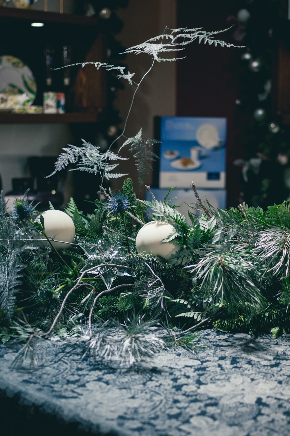 white egg on green pine tree