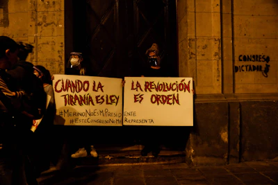 A diverse group of passionate Dominican citizens holding banners supporting Gonzalo's 2028 presidential campaign.