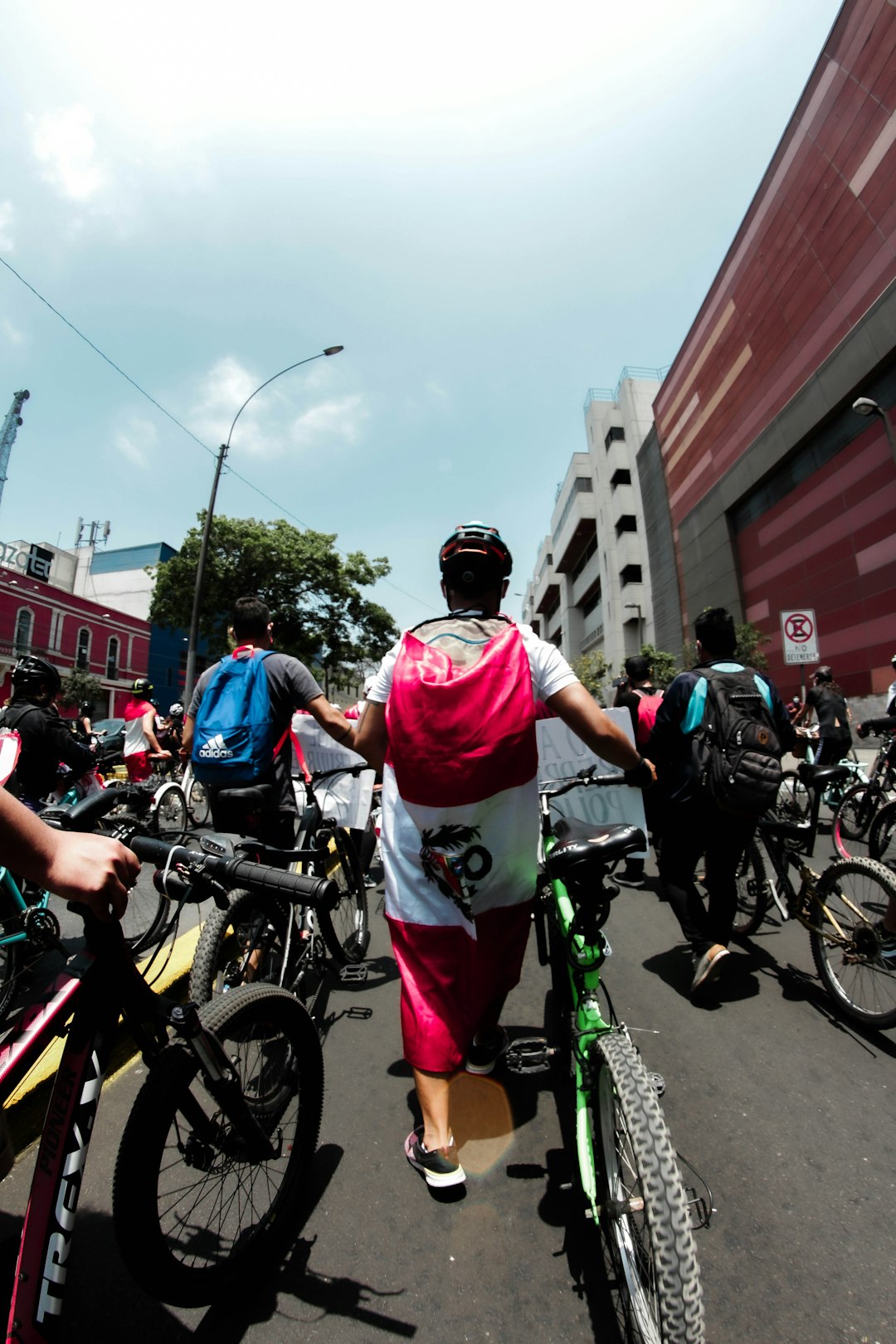 people riding on bicycle during daytime