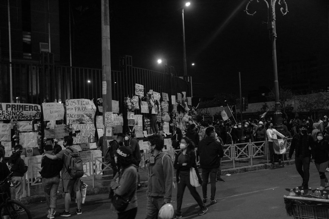 grayscale photo of people on street