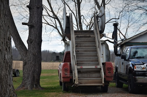 A family using the nana tek step ramp to access a truck, showcasing its practical application.