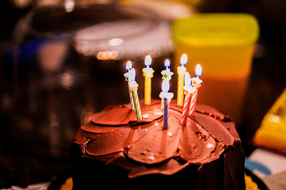 brown cake with candles on top