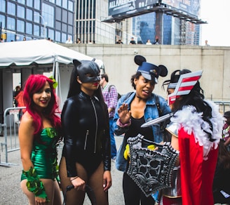 woman in black tank top and black shorts holding white and red textile