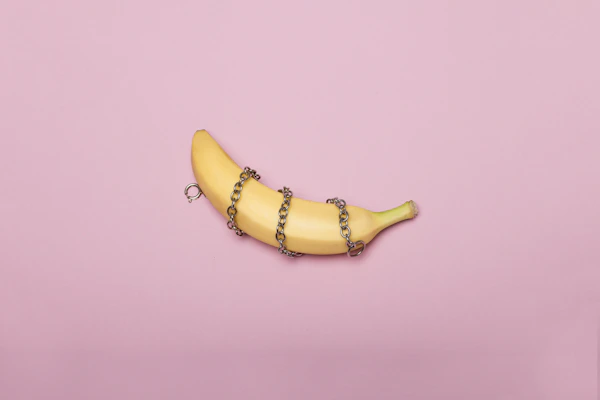 yellow banana on white surface
